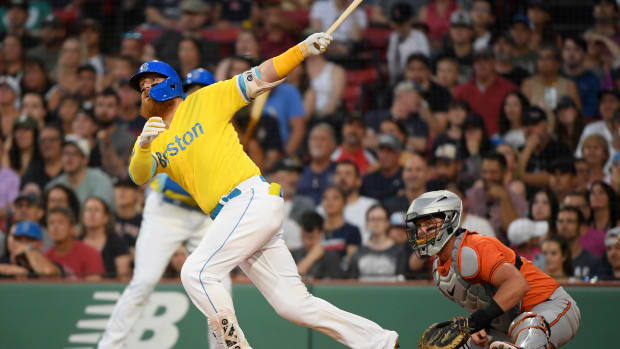 Sep 9, 2023; Boston, Massachusetts, USA; Boston Red Sox designated hitter Justin Turner (2) hits a two run home run during the first inning against the Baltimore Orioles at Fenway Park. Mandatory Credit: Bob DeChiara-USA TODAY Sports